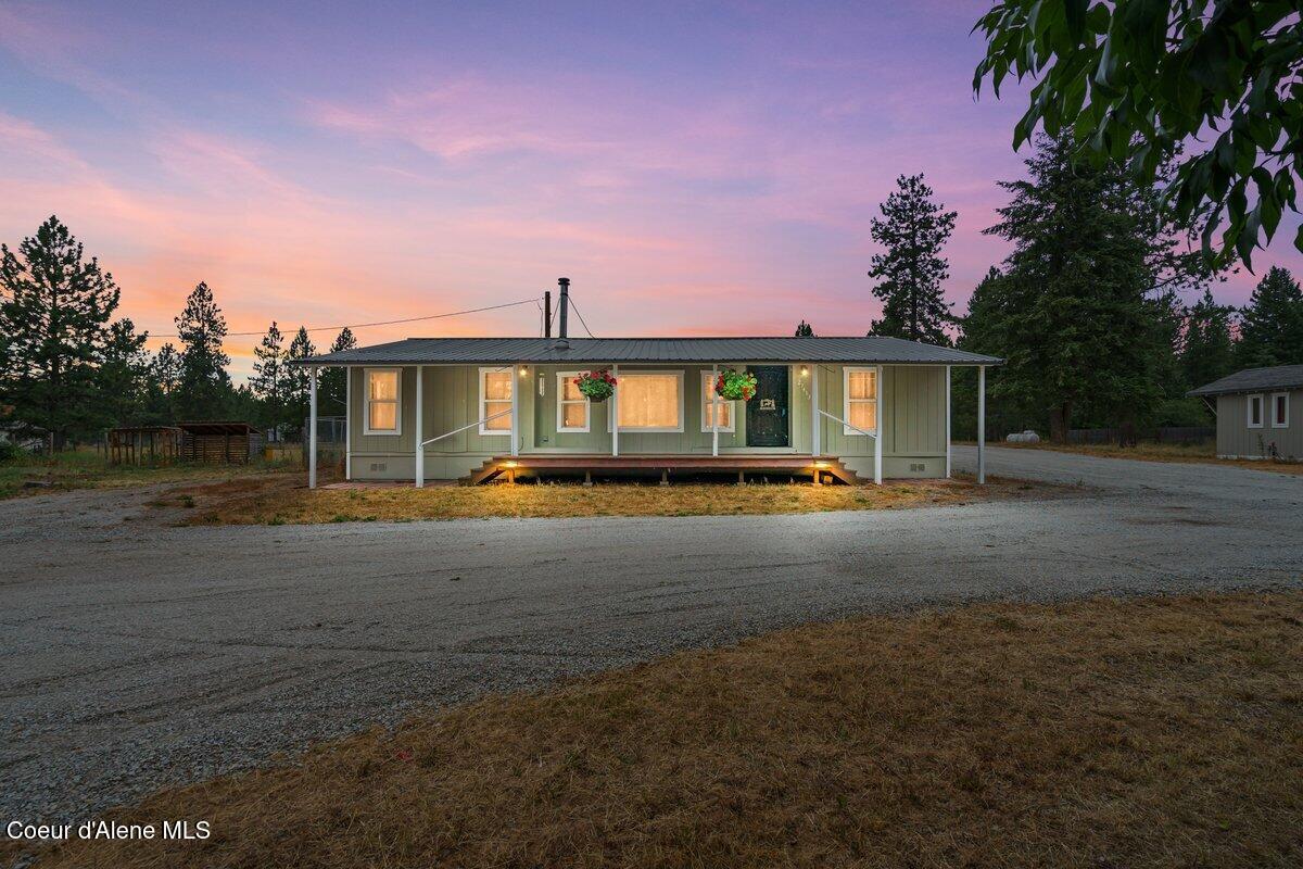 27453 North Ramsey Road Athol, ID 83801 - Photo 2 of 53 Front of home twilight