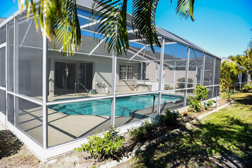 4819 West Raintree Bradenton, FL 34203 - Photo 14 of 37 front view of house with a yard