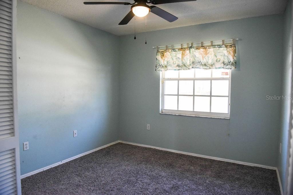 4819 West Raintree Bradenton, FL 34203 - Photo 21 of 37 an empty room with a window