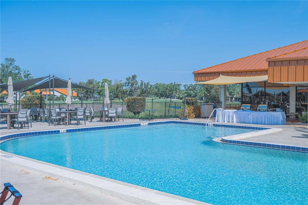 4819 West Raintree Bradenton, FL 34203 - Photo 37 of 37 a view of a swimming pool with a patio