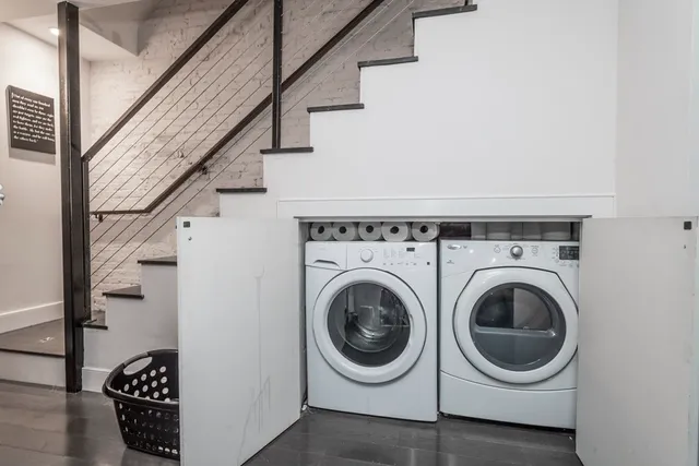 a view of outdoor space and yard from a balcony