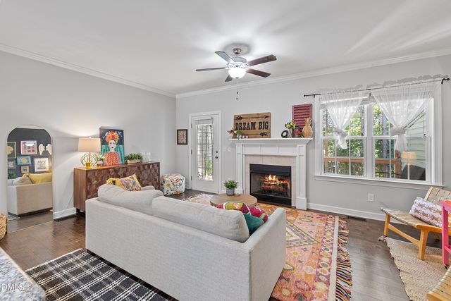 a reading room with furniture and window