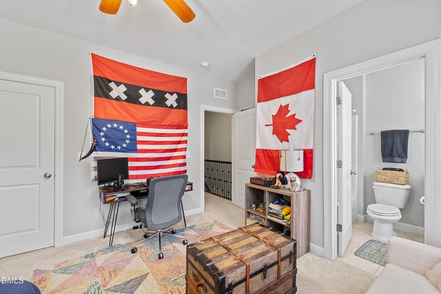 a bathroom with a sink and a window