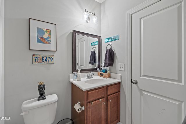 a bathroom with a toilet and sink
