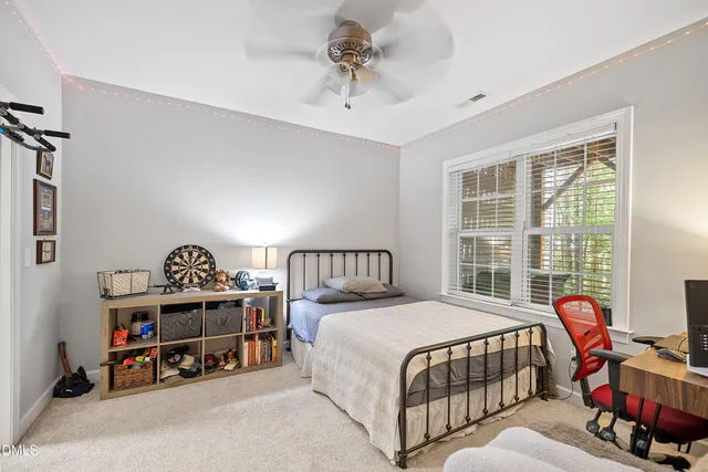 a view of a bedroom with furniture and staircase
