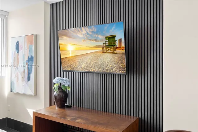 a view of a livingroom with furniture and wooden floor