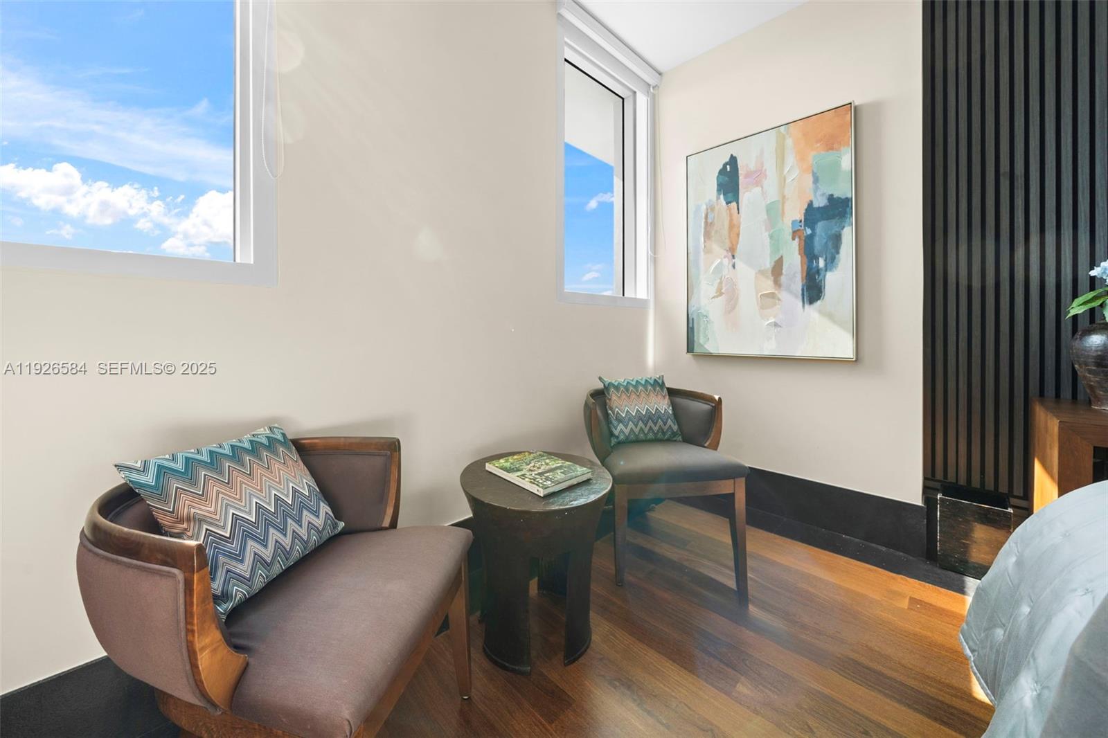 101 20th Street, Unit 3202 Miami Beach, FL 33139 - Photo 30 of 54 a view of a livingroom with furniture and wooden floor