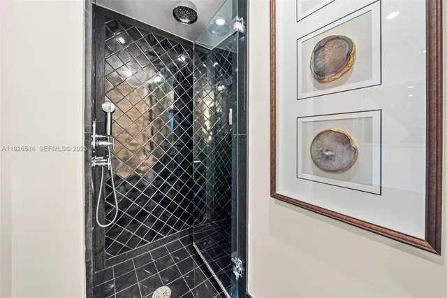 a view of a balcony with chair and wooden floor