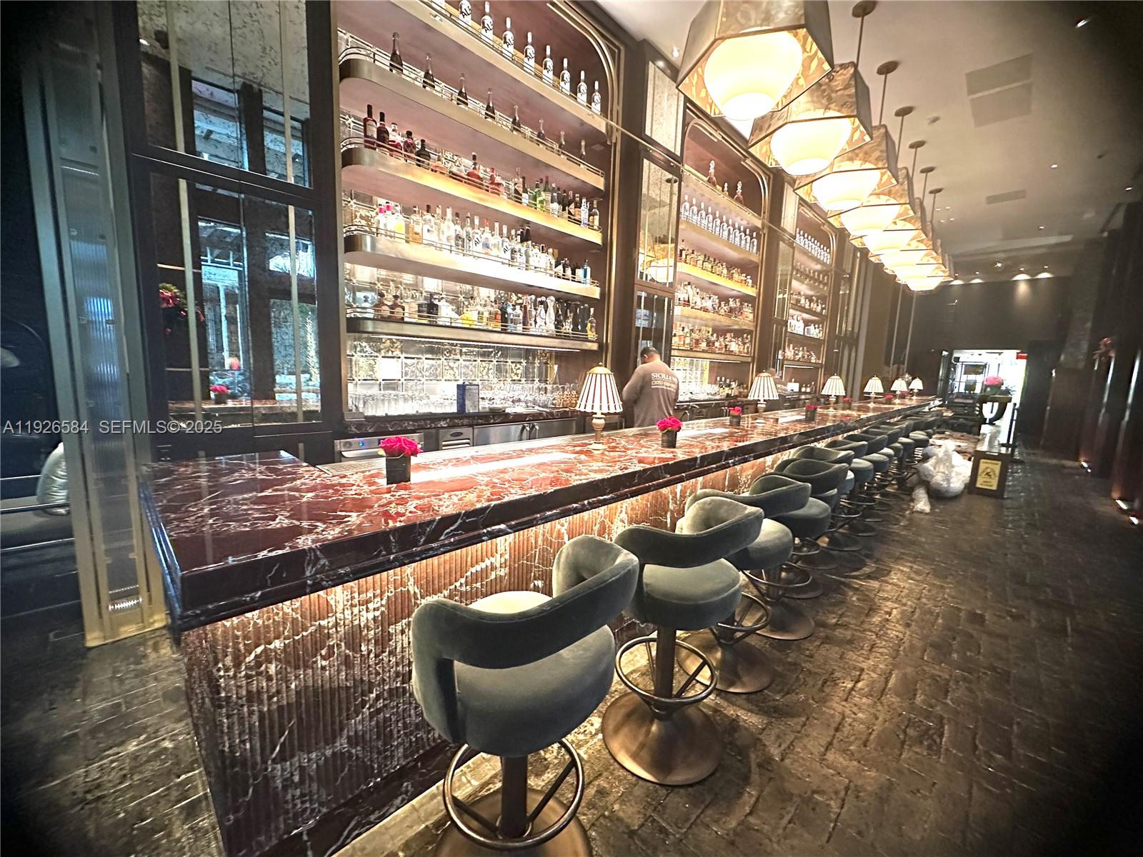 101 20th Street, Unit 3202 Miami Beach, FL 33139 - Photo 53 of 54 a swimming pool with outdoor seating and yard