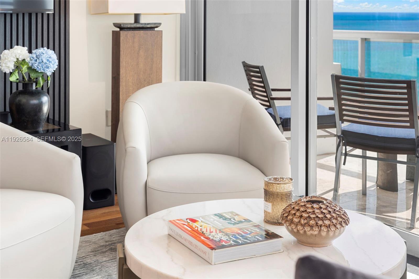 101 20th Street, Unit 3202 Miami Beach, FL 33139 - Photo 9 of 54 a living room with furniture and a potted plant
