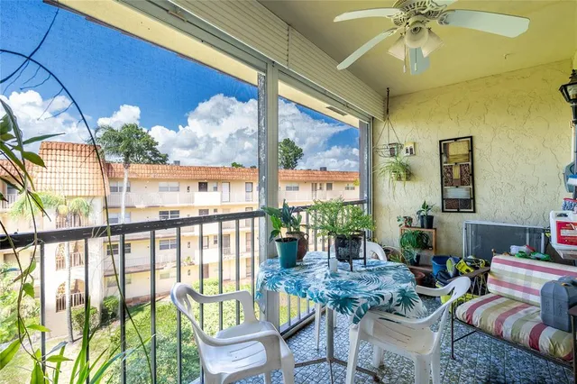 a outdoor dining space with furniture