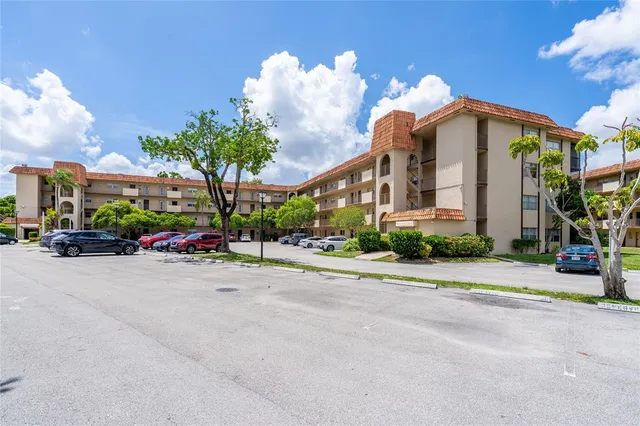 a view of a street with cars