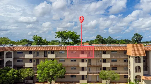 a front view of building with outdoor space