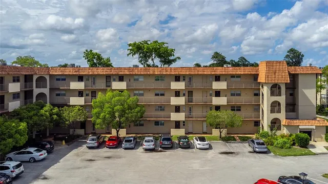 an aerial view of a city with lots of residential buildings
