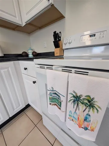 a bathroom with a sink mirror and toilet