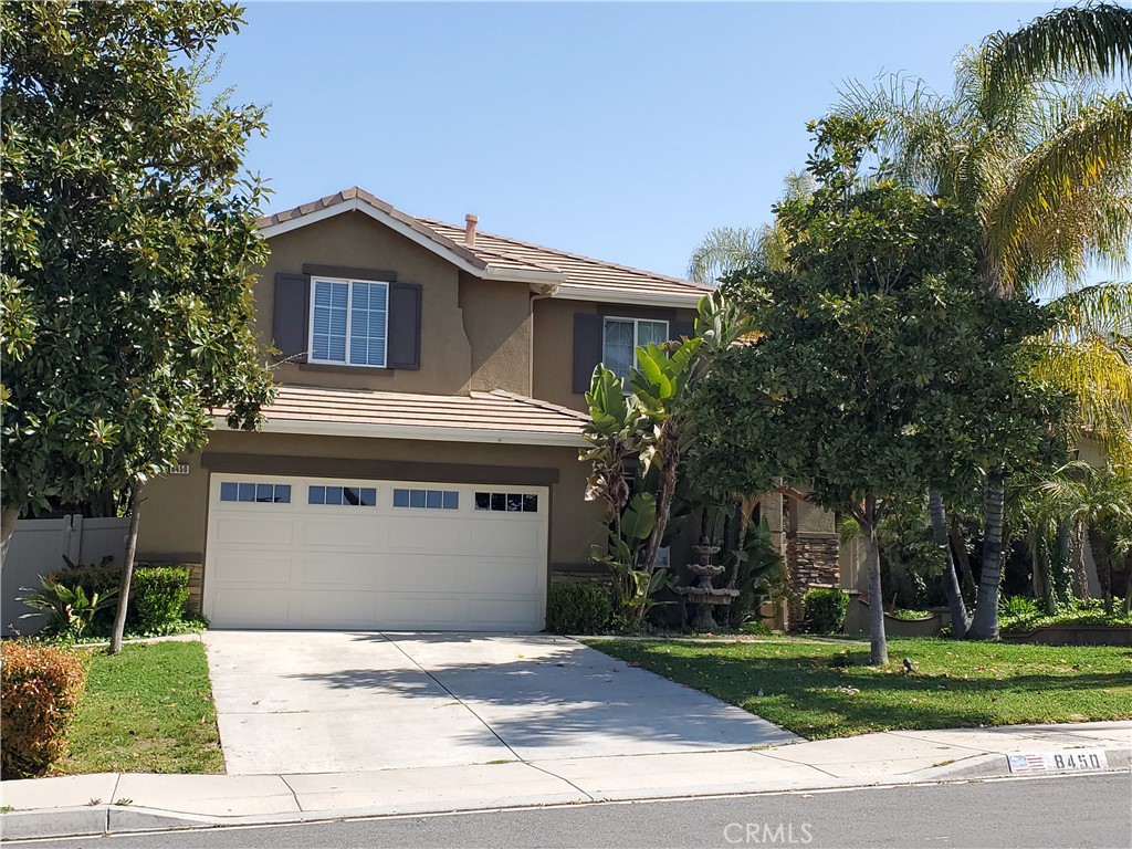 8450 Farmhouse Lane Riverside, CA 92508 - Photo 1 of 1 a front view of a house with a garden