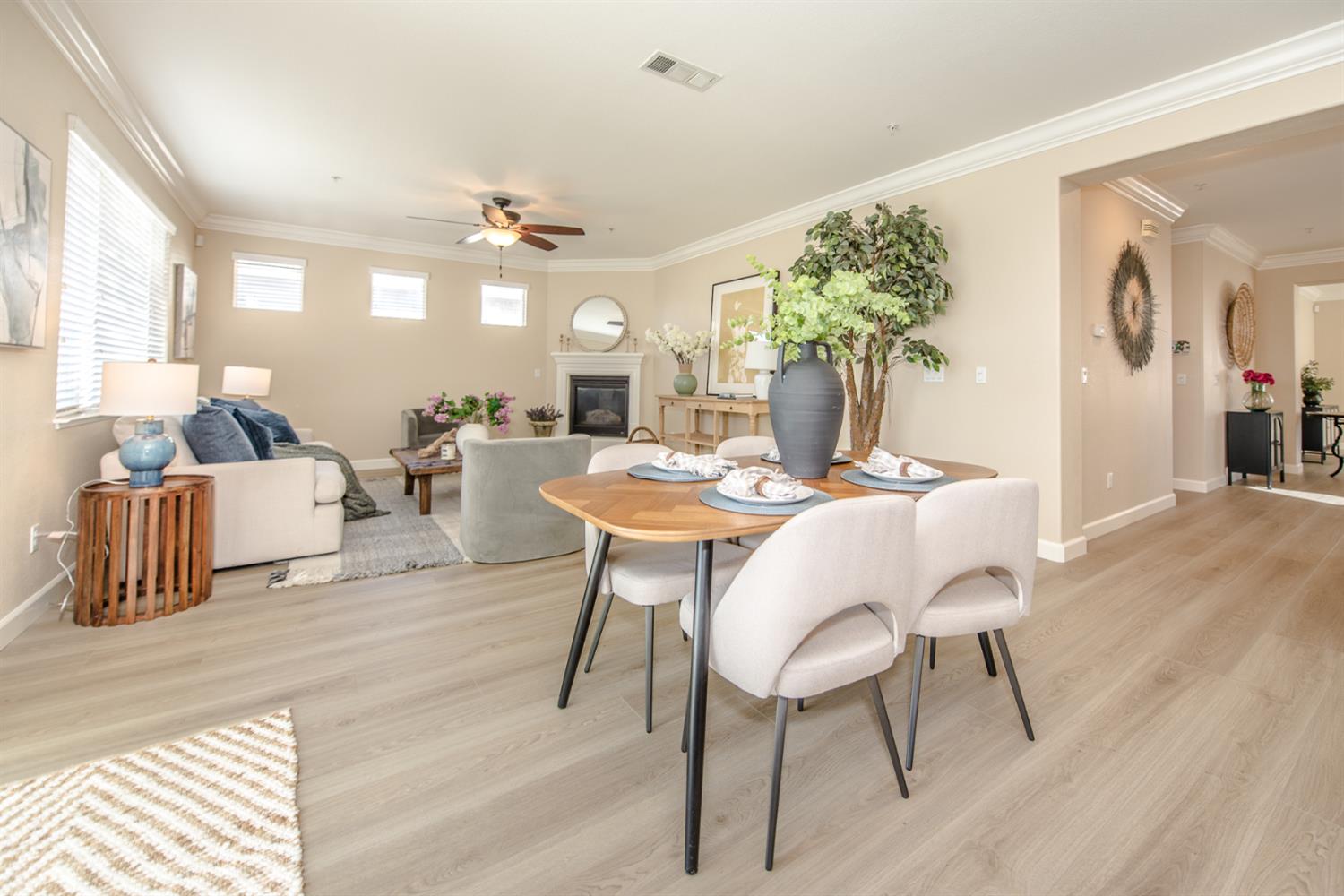 1701 Sandypoint Road West Sacramento, CA 95691 - Photo 14 of 41 a view of a dining room with furniture window and wooden floor