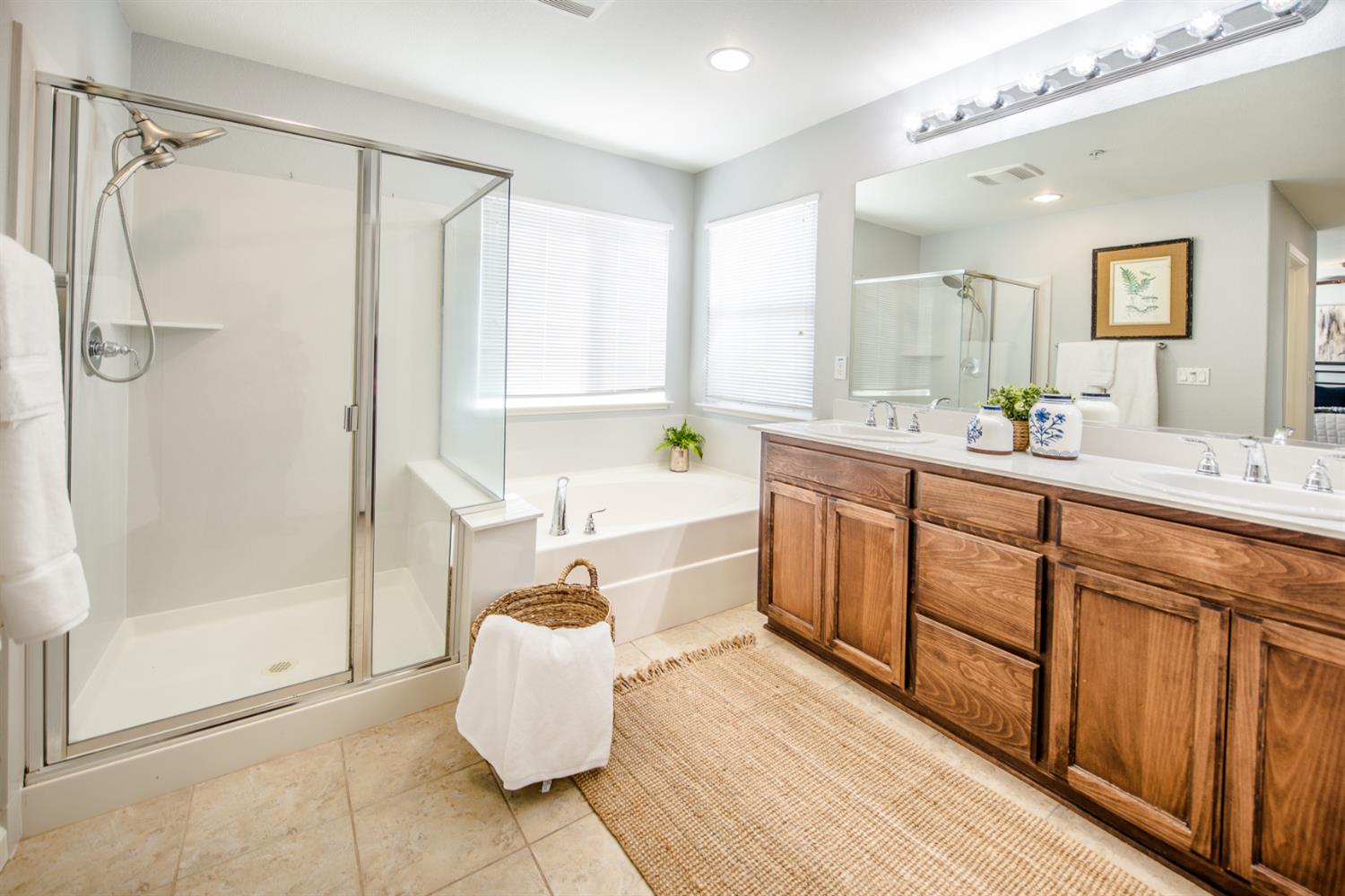 1701 Sandypoint Road West Sacramento, CA 95691 - Photo 36 of 41 a large bathroom with a tub sink shower and mirror
