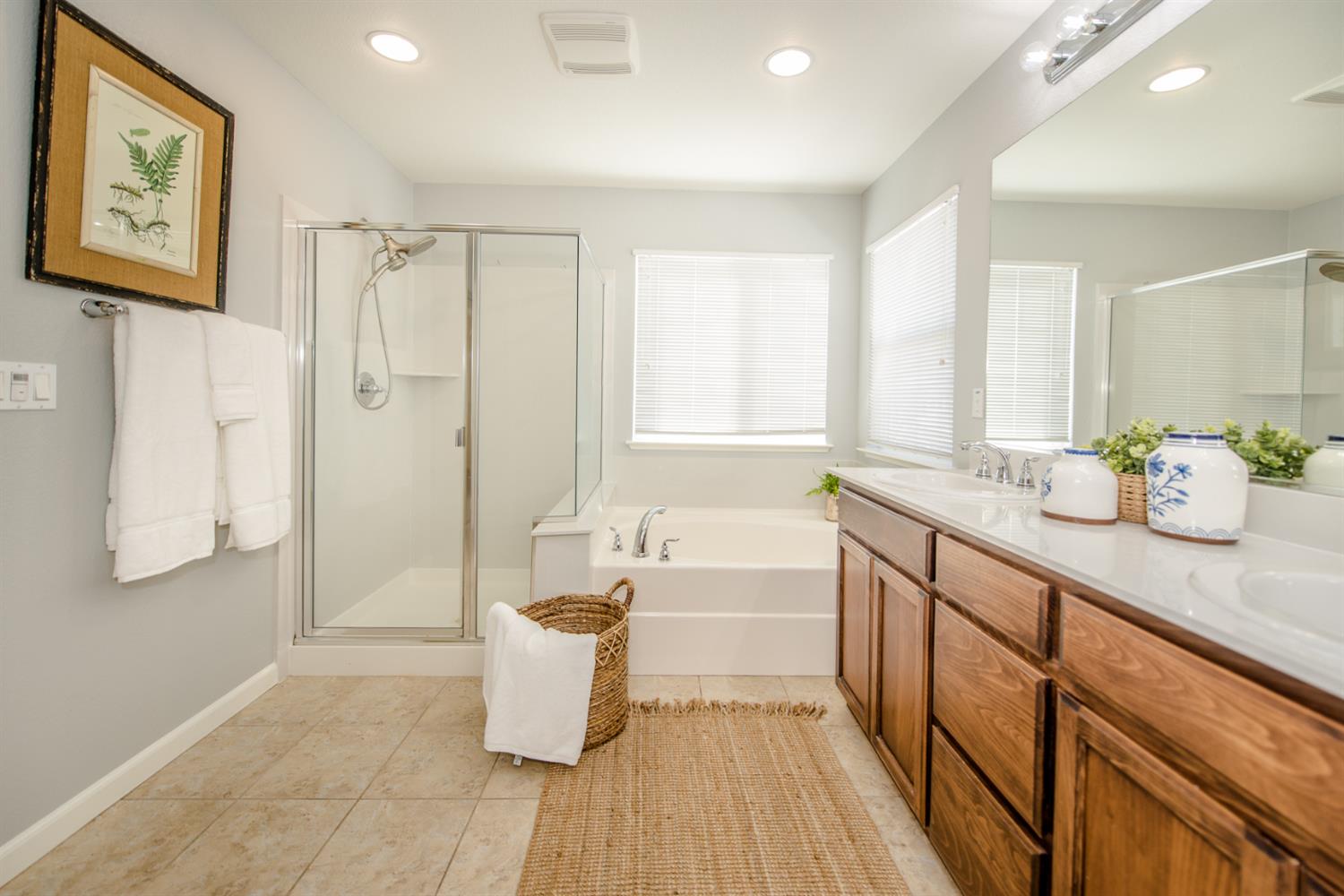 1701 Sandypoint Road West Sacramento, CA 95691 - Photo 37 of 41 a spacious bathroom with a tub sink and mirror