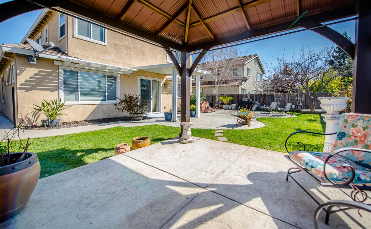 1701 Sandypoint Road West Sacramento, CA 95691 - Photo 39 of 41 a view of a patio with a table and chairs and potted plants