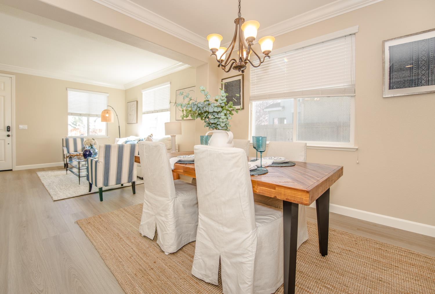 1701 Sandypoint Road West Sacramento, CA 95691 - Photo 4 of 41 a view of a dining room with furniture and wooden floor