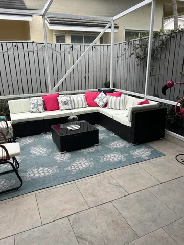 a living room with a couch and a table
