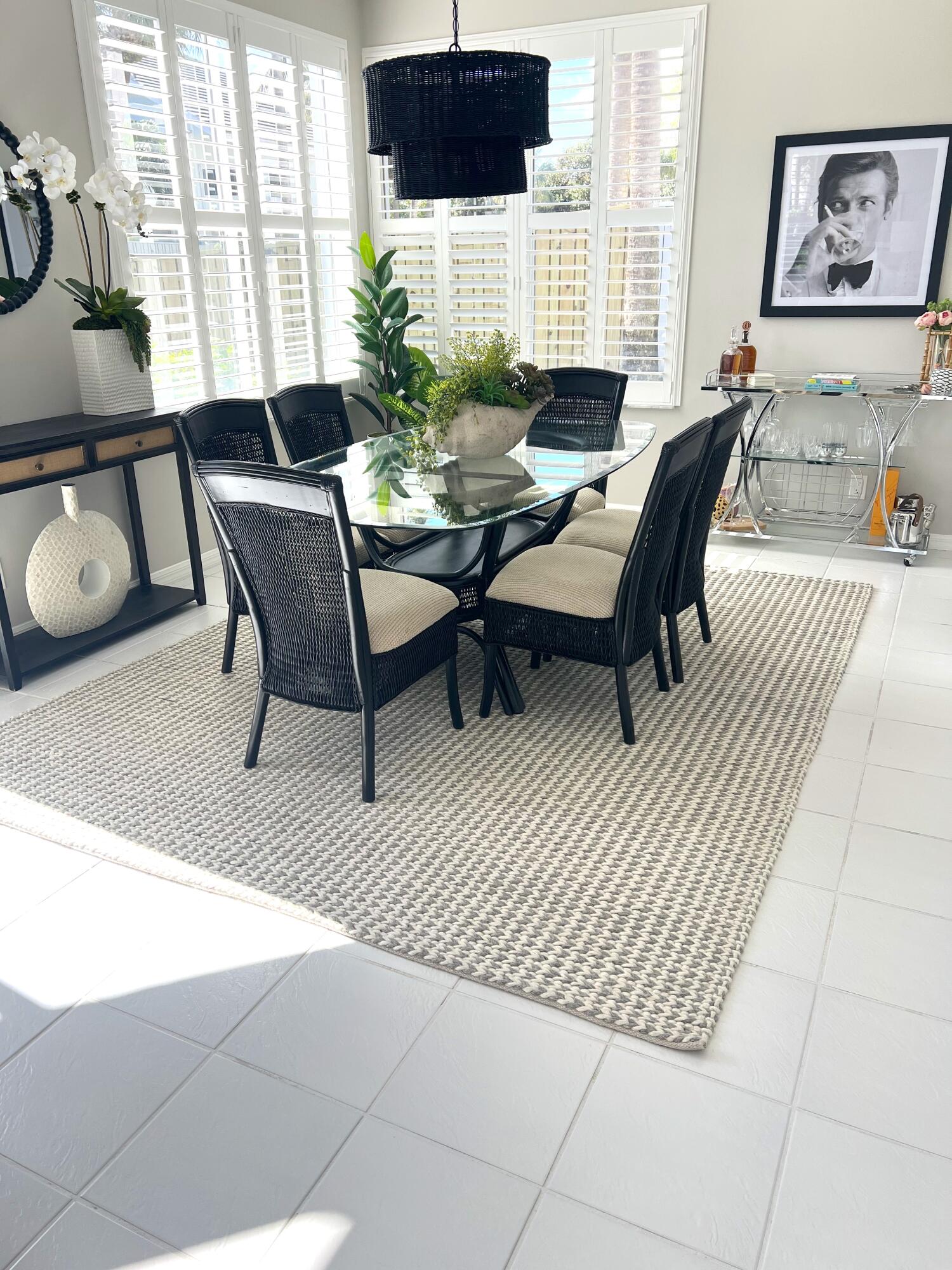 3028 Windward Way Jupiter, FL 33477 - Photo 4 of 48 a living room with furniture and a potted plant