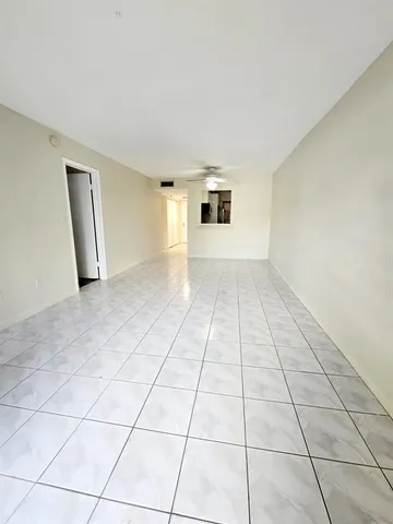 a kitchen with a refrigerator stove and microwave