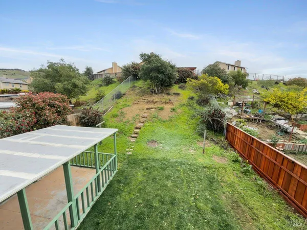 a balcony with an outdoor space