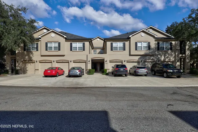 a car parked in front of a house