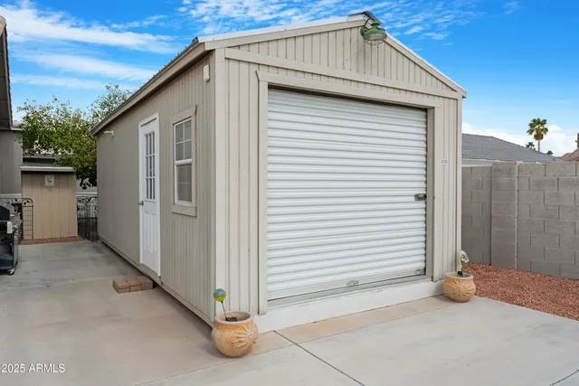 a house view with a backyard space