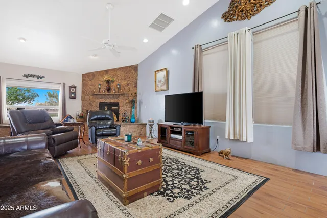a dining room with furniture and window