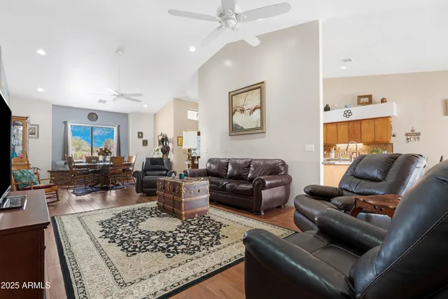 a living room with furniture rug and window