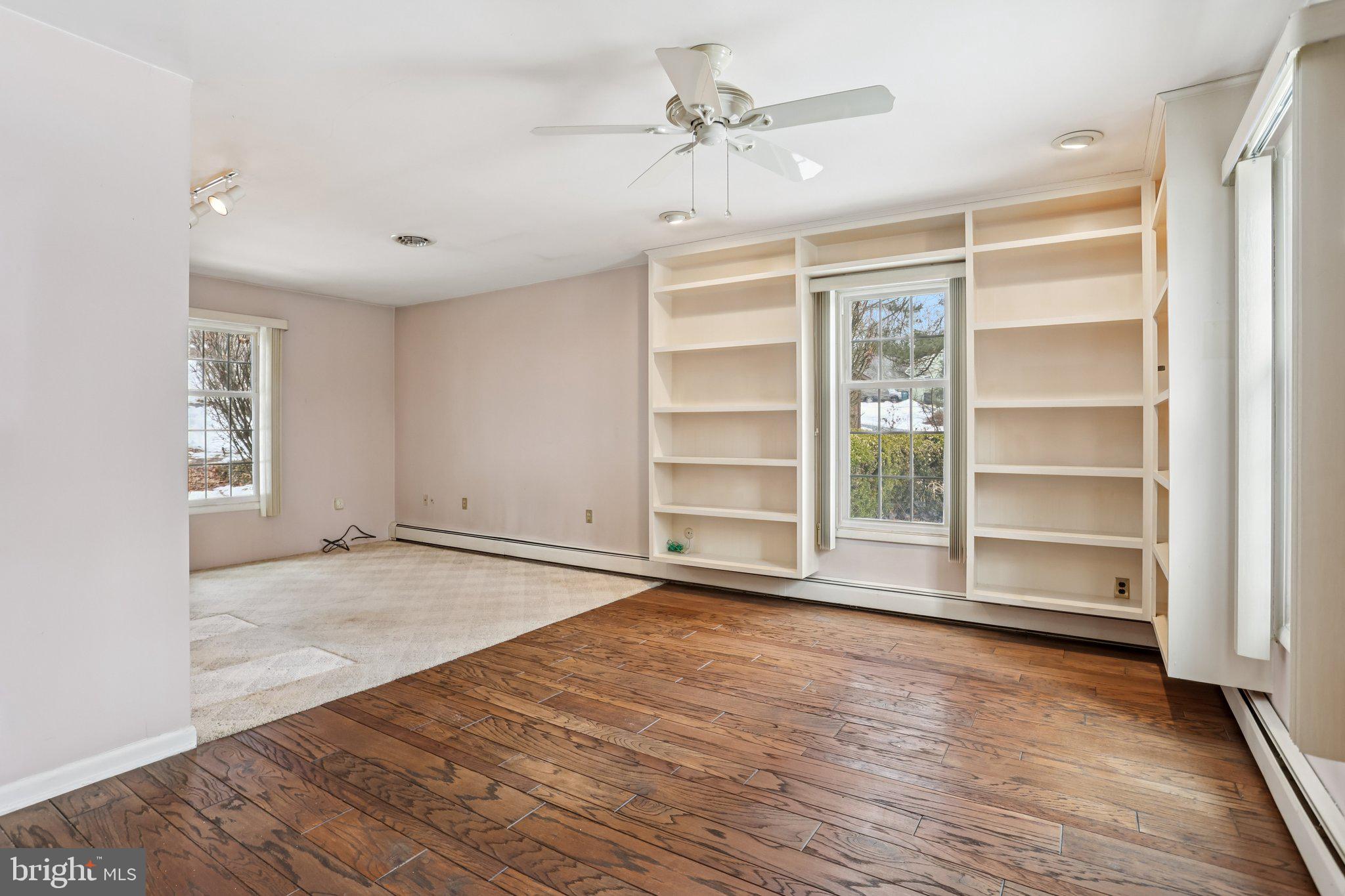 194 Long Lane Kirkwood, PA 17536 - Photo 18 of 56 a view of an empty room with a window and wooden floor