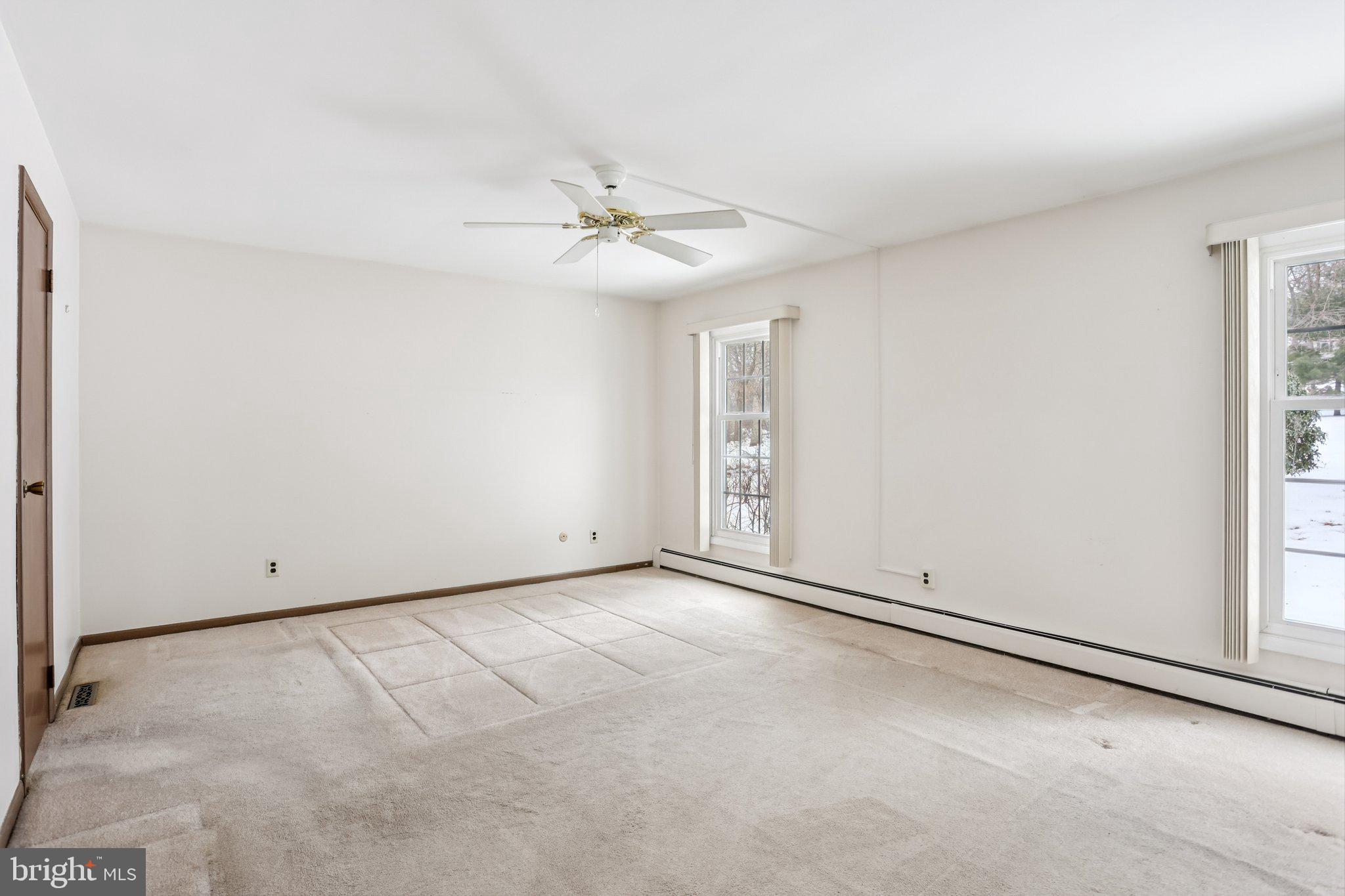 194 Long Lane Kirkwood, PA 17536 - Photo 24 of 56 an empty room with windows and fan