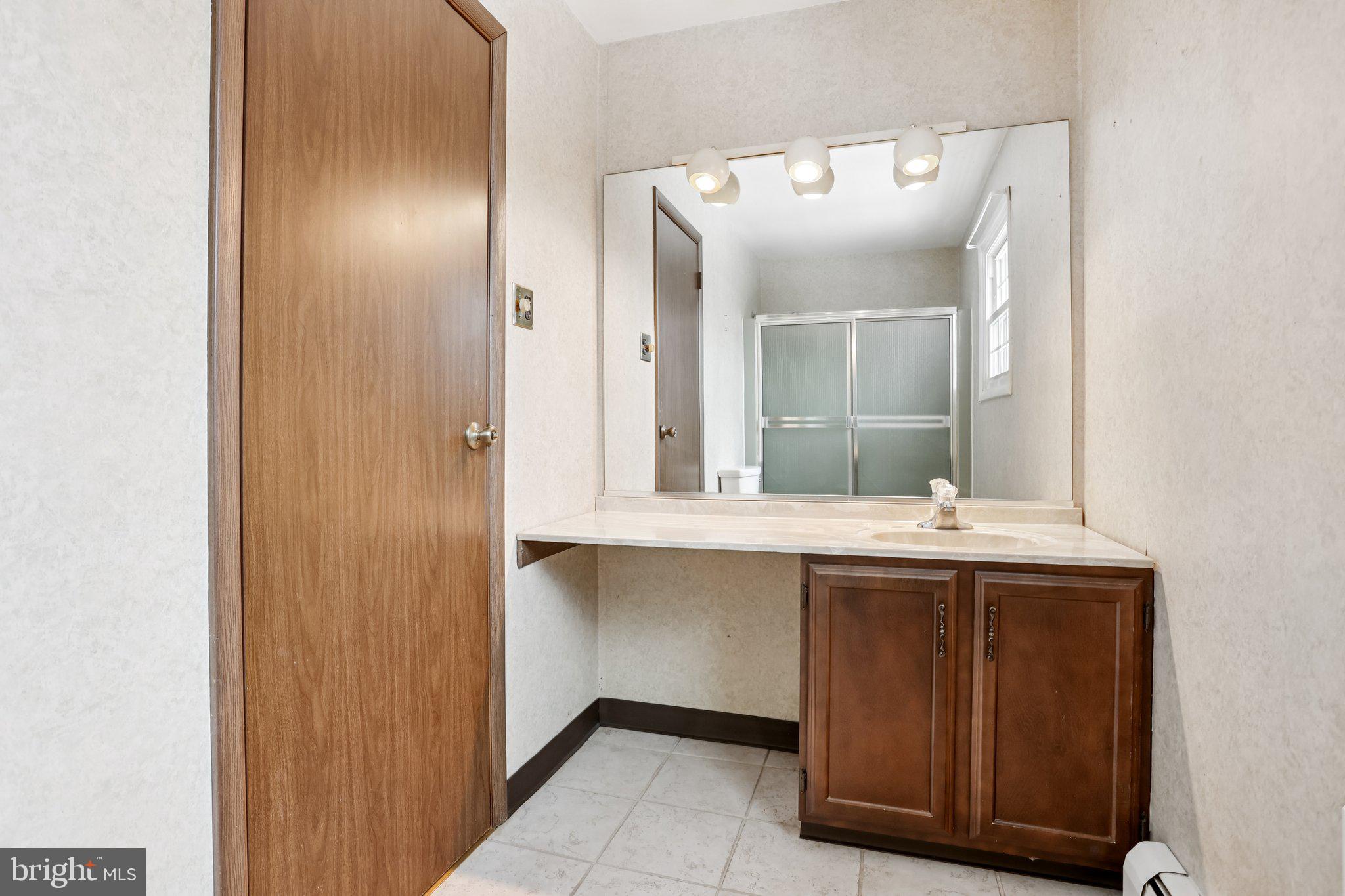 194 Long Lane Kirkwood, PA 17536 - Photo 30 of 56 a bathroom with a sink and mirror