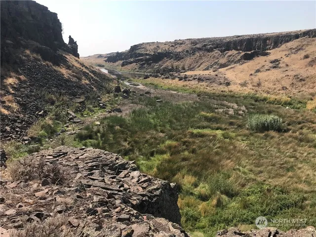 a view of a lake with outdoor space
