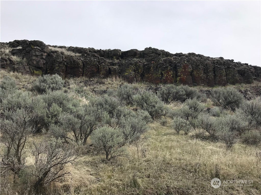 32761 Northeast K Road Coulee City, WA 99115 - Photo 5 of 27 a view of a mountain range with a mountain