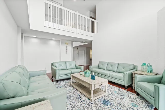 a living room with furniture and a couch