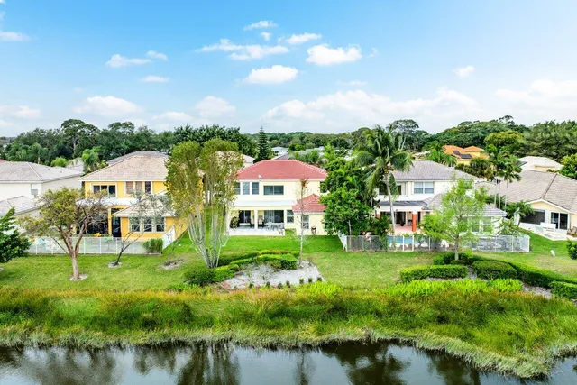 a view of a garden with houses