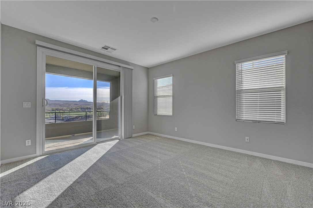 19 Strada Barbera Henderson, NV 89011 - Photo 25 of 53 Primary bedroom with balcony