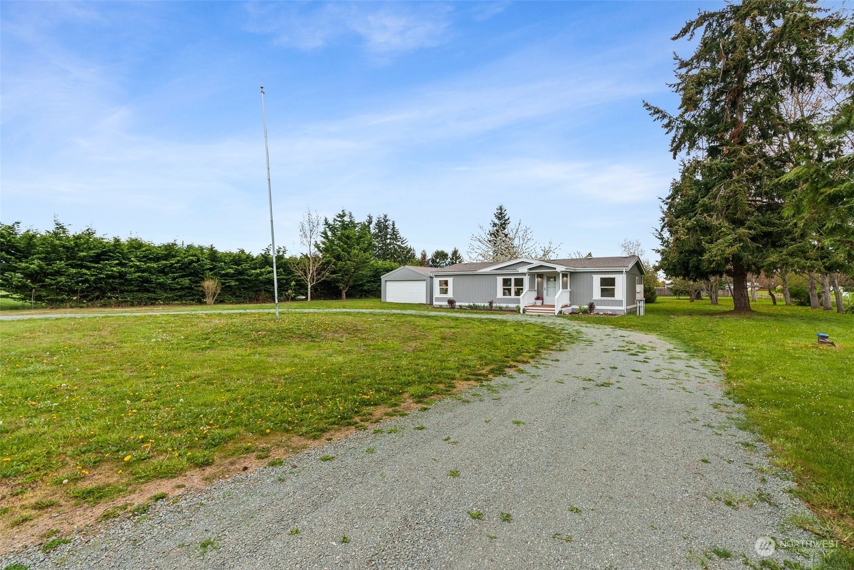 951 Heath Road Sequim, WA 98382 - Photo 3 of 34 a view of a house with a yard
