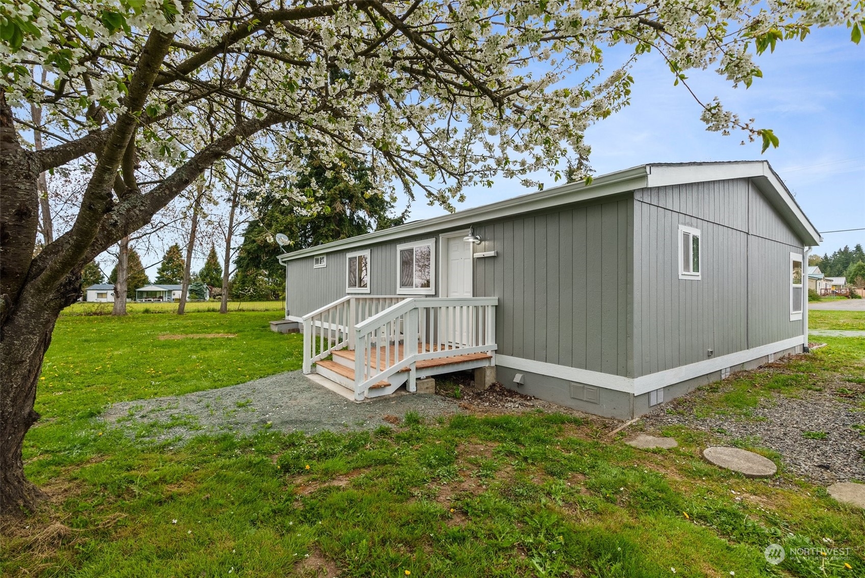 951 Heath Road Sequim, WA 98382 - Photo 31 of 34 a view of backyard with a garden and entertaining space
