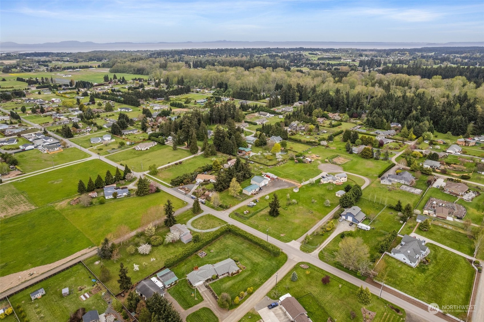 951 Heath Road Sequim, WA 98382 - Photo 7 of 34 an aerial view of residential houses with outdoor space