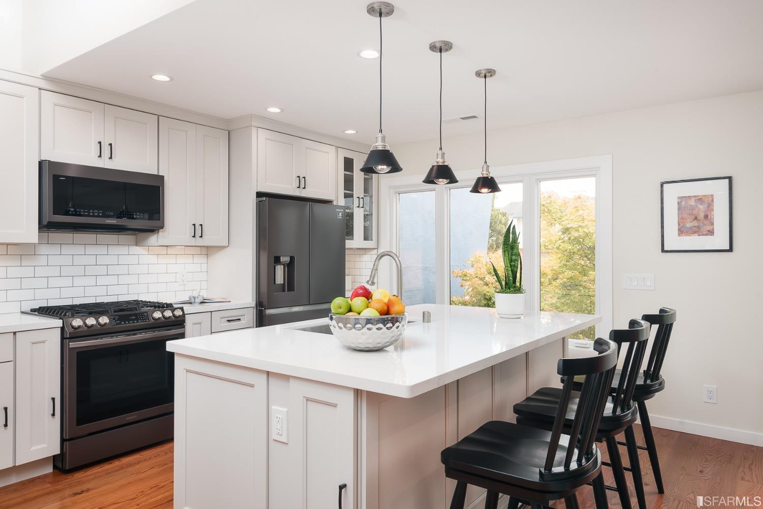 Molimo Drive San Francisco, CA 94127 - Photo 16 of 53 a kitchen with stainless steel appliances a dining table chairs and a kitchen view