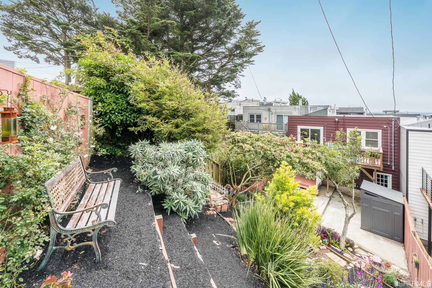 Molimo Drive San Francisco, CA 94127 - Photo 43 of 53 a balcony with table and chairs and potted plants