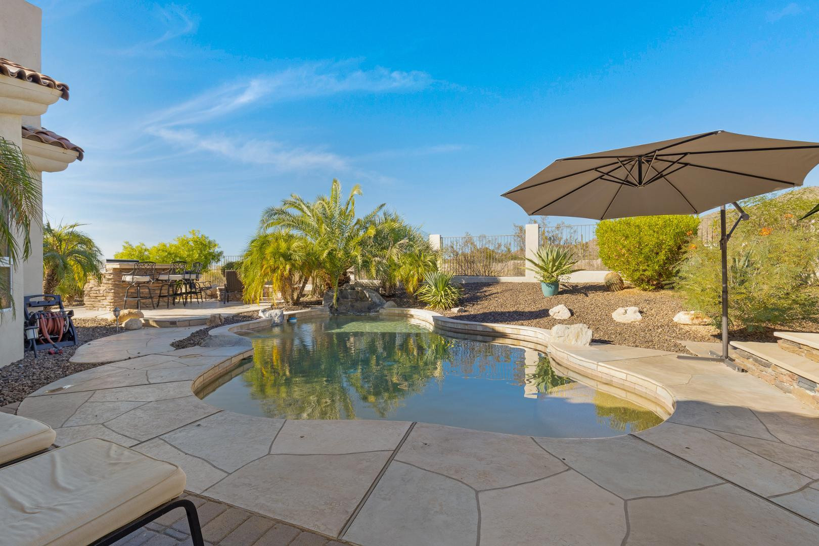 8540 East McDowell Road, Unit 10 Mesa, AZ 85207 - Photo 19 of 25 a view of swimming pool with outdoor seating