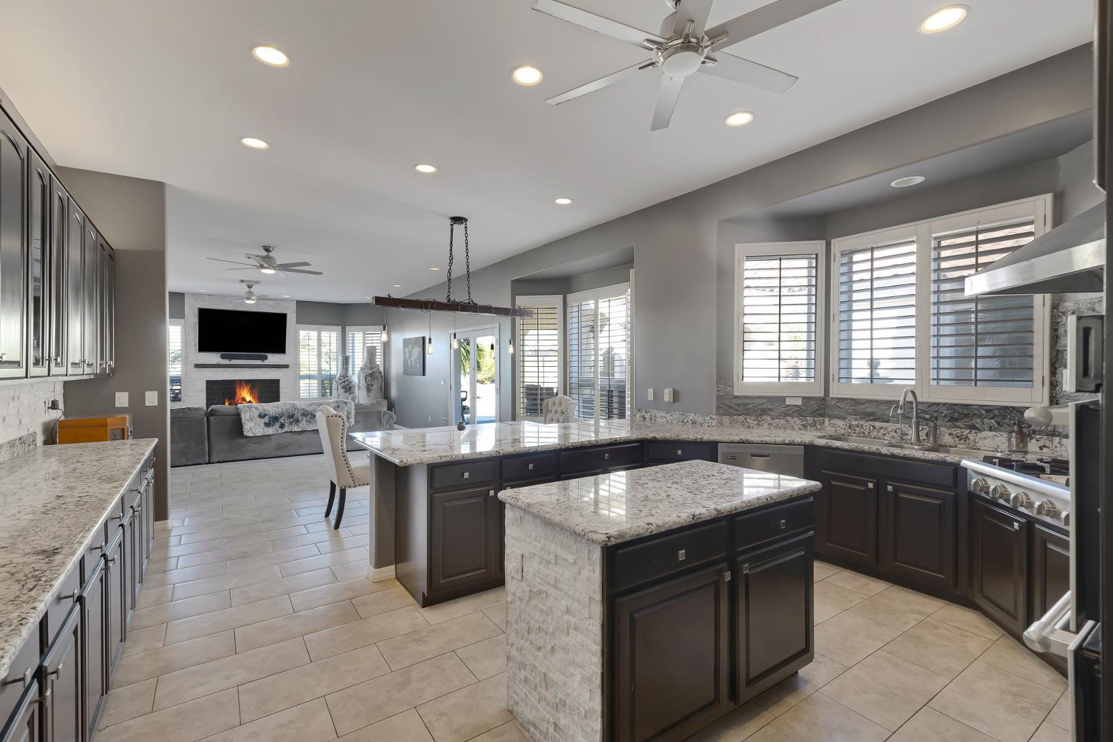 8540 East McDowell Road, Unit 10 Mesa, AZ 85207 - Photo 6 of 25 a large kitchen with a large counter top space