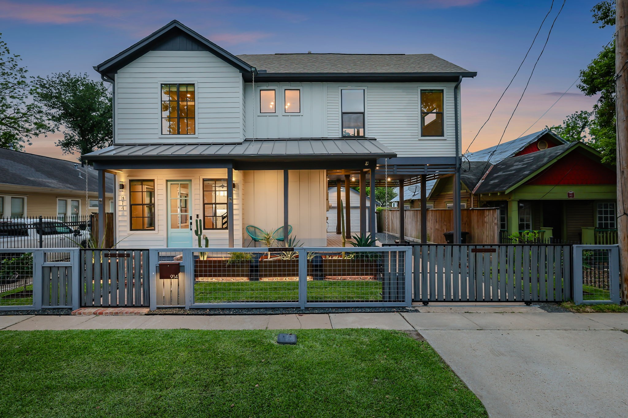 914 Robbie Street Houston, TX 77009 - Photo 1 of 50 a front view of a house with a yard