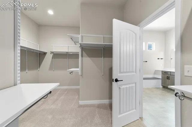 a bathroom with a tub and shower